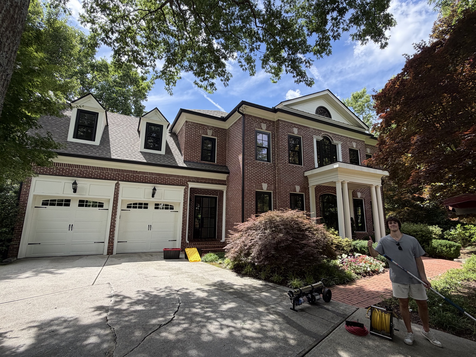 Window cleaning project on a two-story brick home in Buckhead